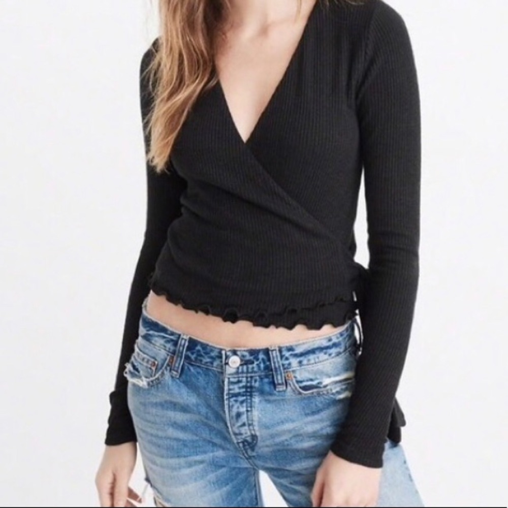 Cropped black long sleeve wrap top